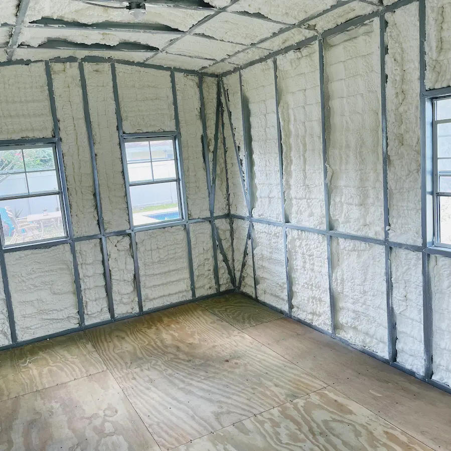 Closed-cell spray foam insulation applied to wall cavities in a residential project in South Middleton